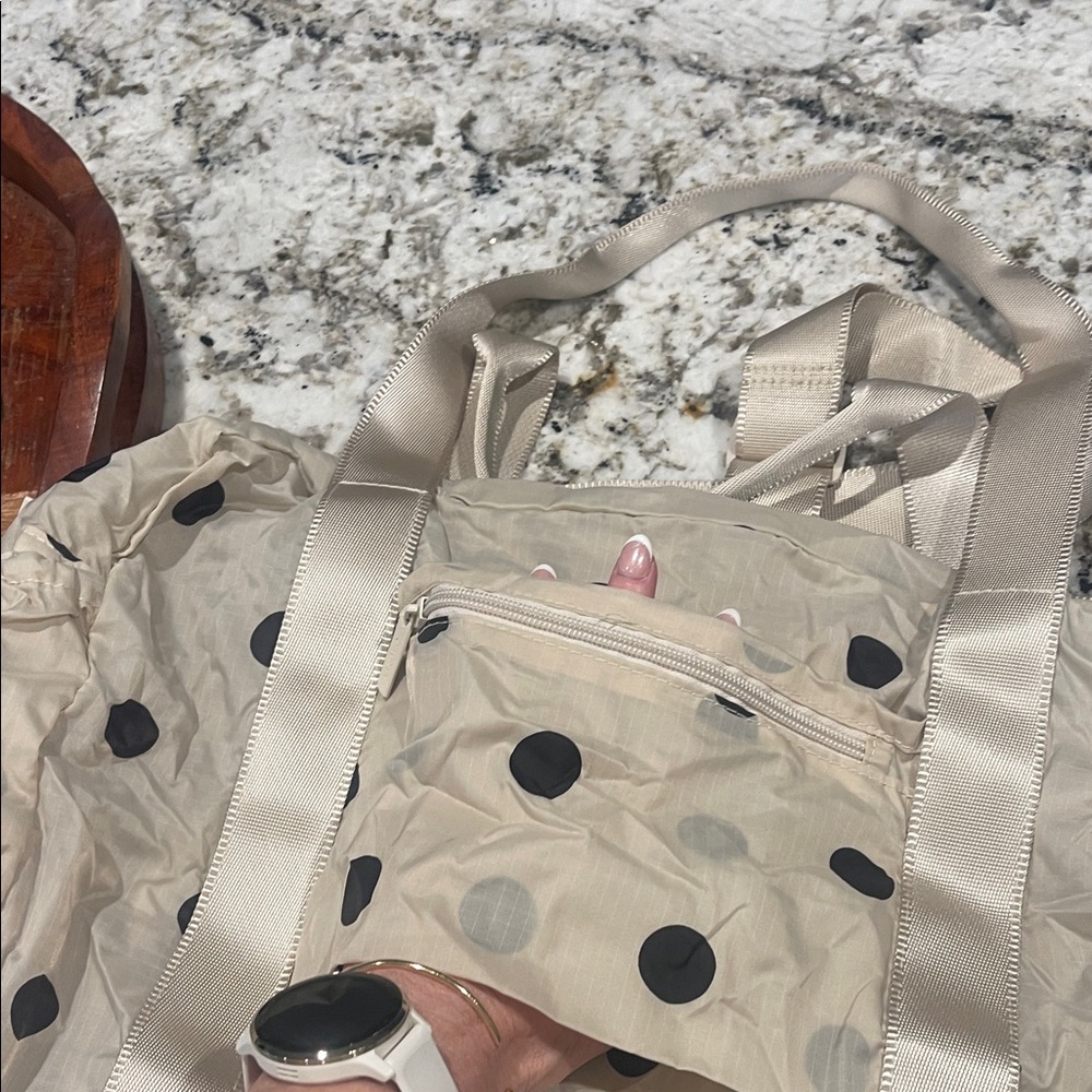 Calpak Cream Travel Duffel with Black Polka Dots - Picture 3 of 5